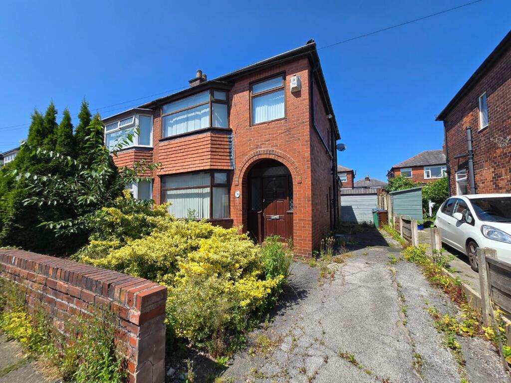 Main image of property: 14 Eastham Avenue, Bury, BL9 5HL