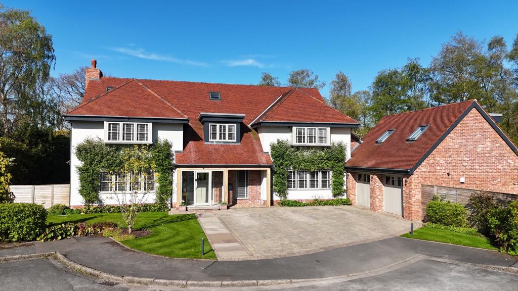 Main image of property: Milverton Drive, Bramhall, SK7