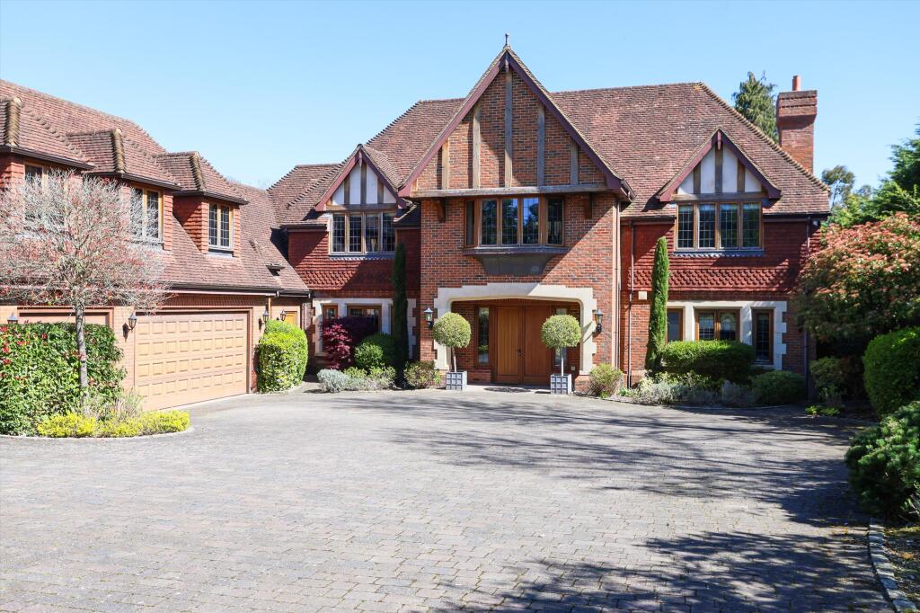 Main image of property: 21 Princes Drive, Oxshott, Surrey KT22