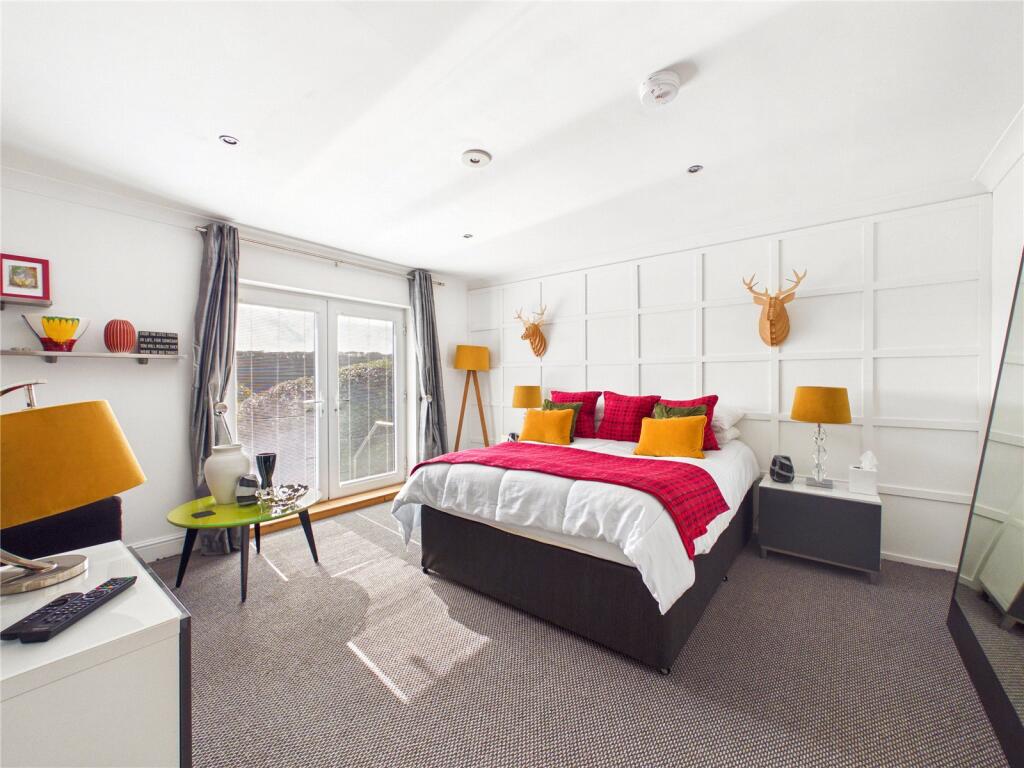 House in Swansea - More