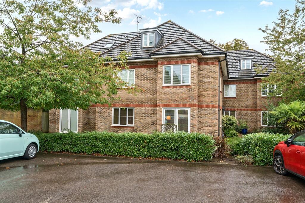 Main image of property: Woodgate Close, Cobham, KT11