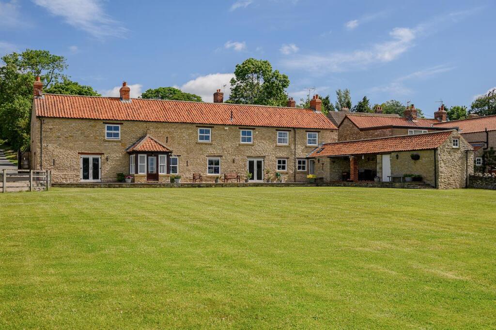 Main image of property: Manor Garth, Main Street, Aislaby, North Yorkshire, YO18 8PE