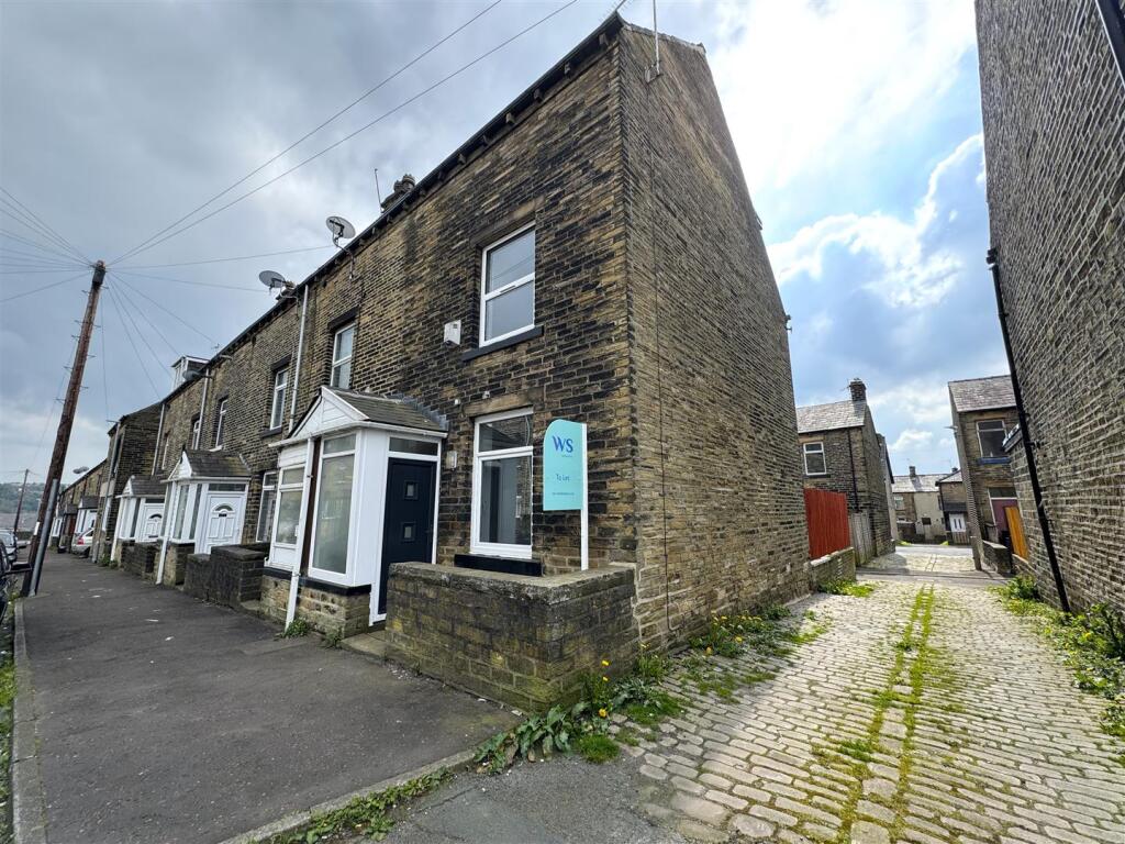 Main image of property: Woodside Place, Halifax, HX3 6EQ