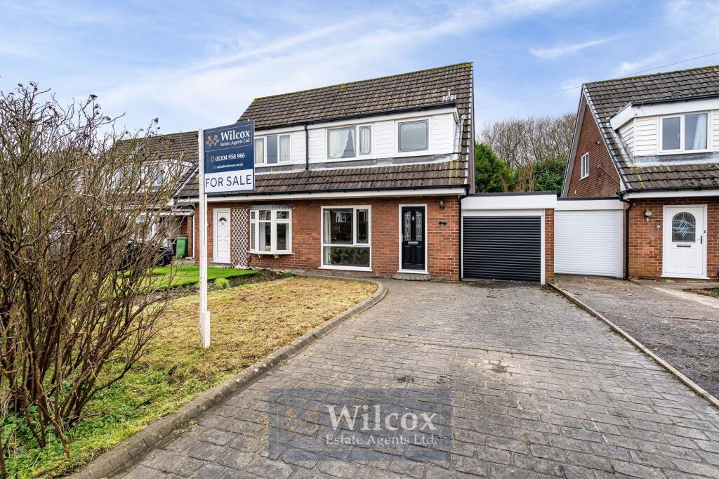 Main image of property: Harpford Drive, Bolton, BL2