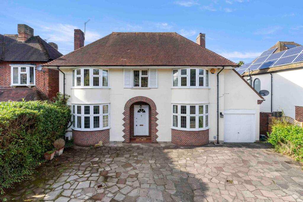 Main image of property: Manor Road South, Esher, KT10
