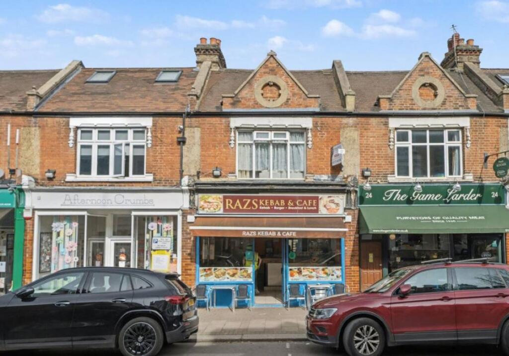 Main image of property: 26A The Parade, Claygate, Esher, Surrey, KT10 0NU