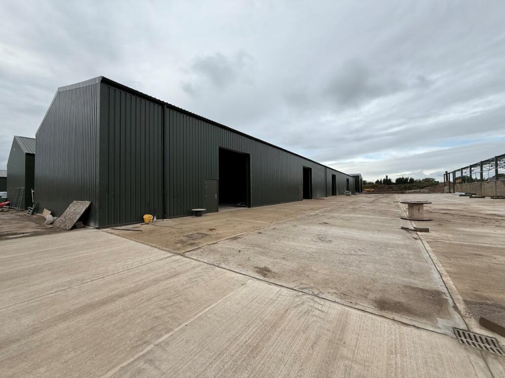 Main image of property: Rixton Industrial Estate, Clevelands Farm, Moss Side Lane, Warrington, WA3 6HQ