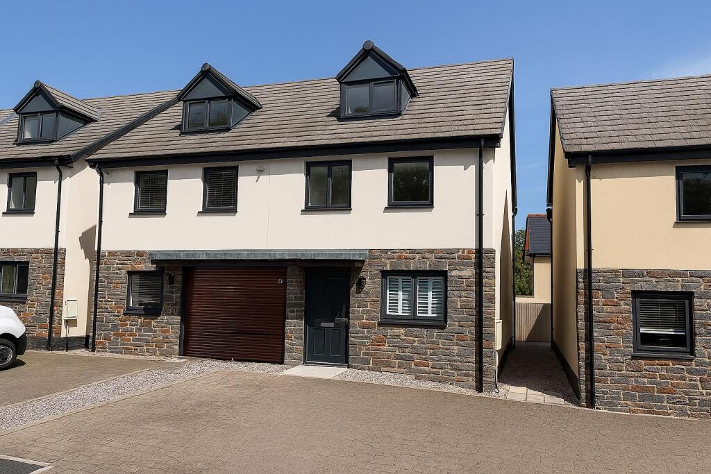 Main image of property: Modern family home offering three double bedrooms, located in the village of Claverham