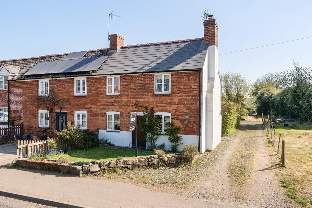 Main image of property: Laburnum Cottage, Baschurch - A charming cottage