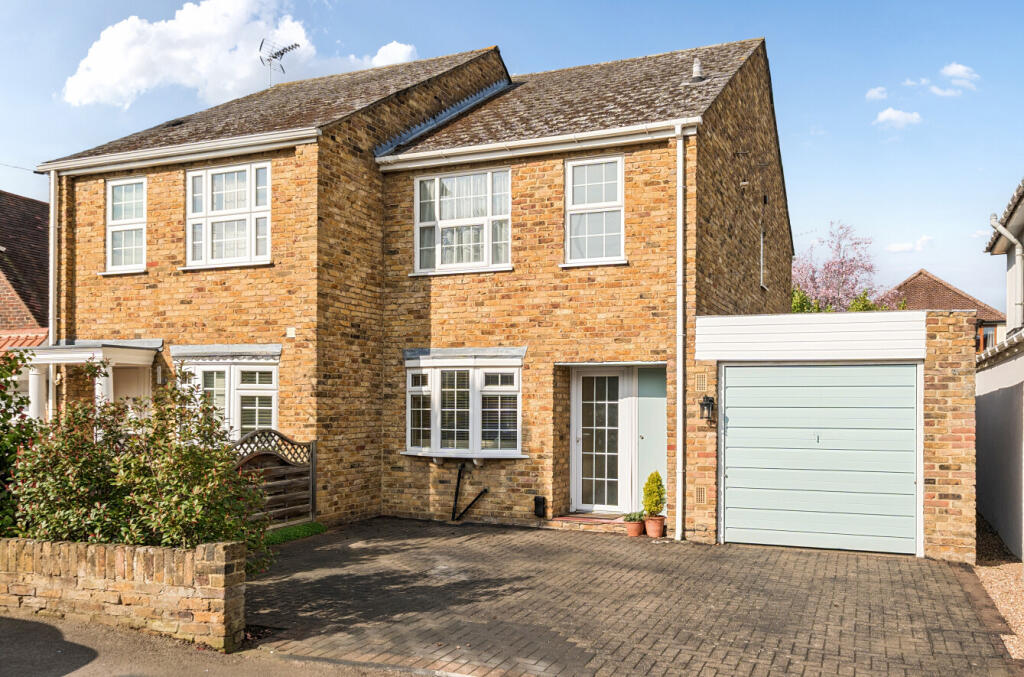 Main image of property: Burwood Road, Hersham, KT12