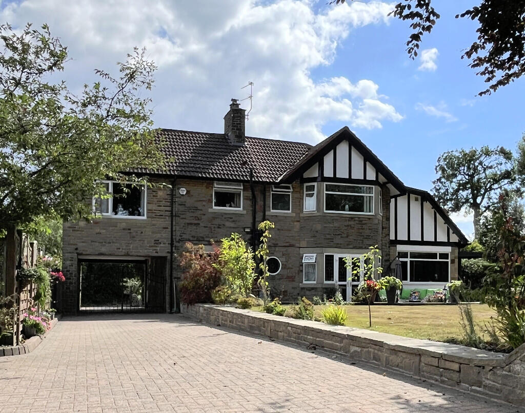 Main image of property: Whispering Spinney, Beechwood Road, Holmfield, Halifax, HX2 9BU