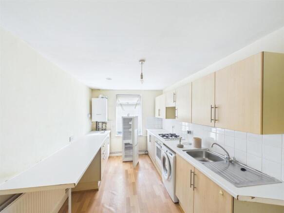 8 - Vacant shop, one-bedroom flat &amp; rear workshop.