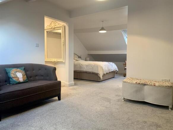 Bedroom Two and seating area.JPG