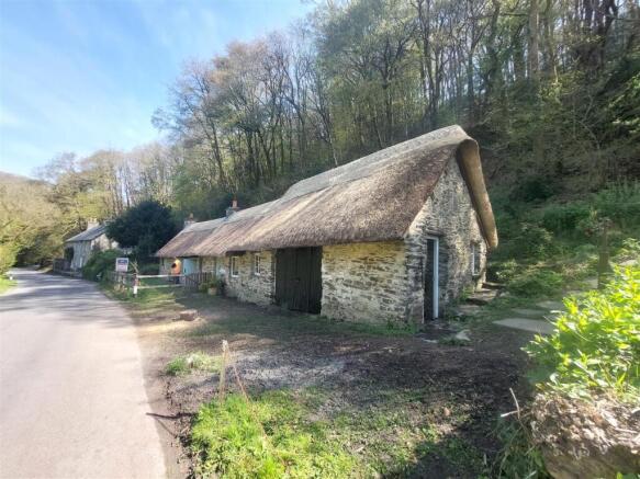 thatched workshops and detached house