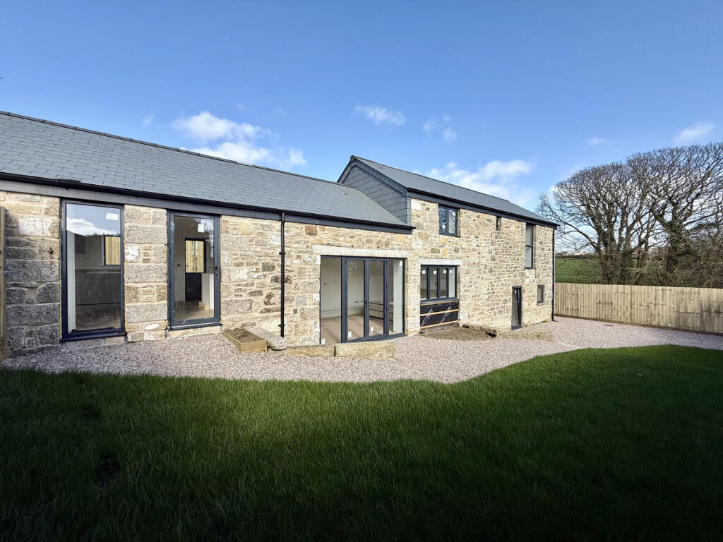 Main image of property: Beautifully crafted detached barn conversion, Helston