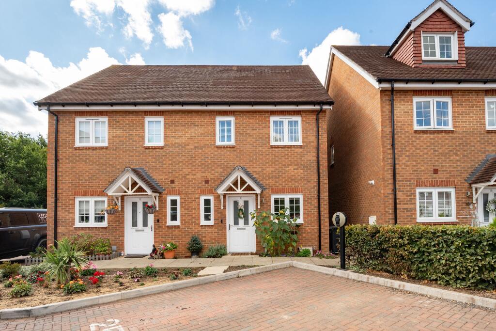 Main image of property: Cooper Close, Horley