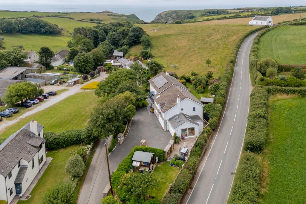Main image of property: An exceptional 7-Bedroom home with flexible living and stunning Rhossili location