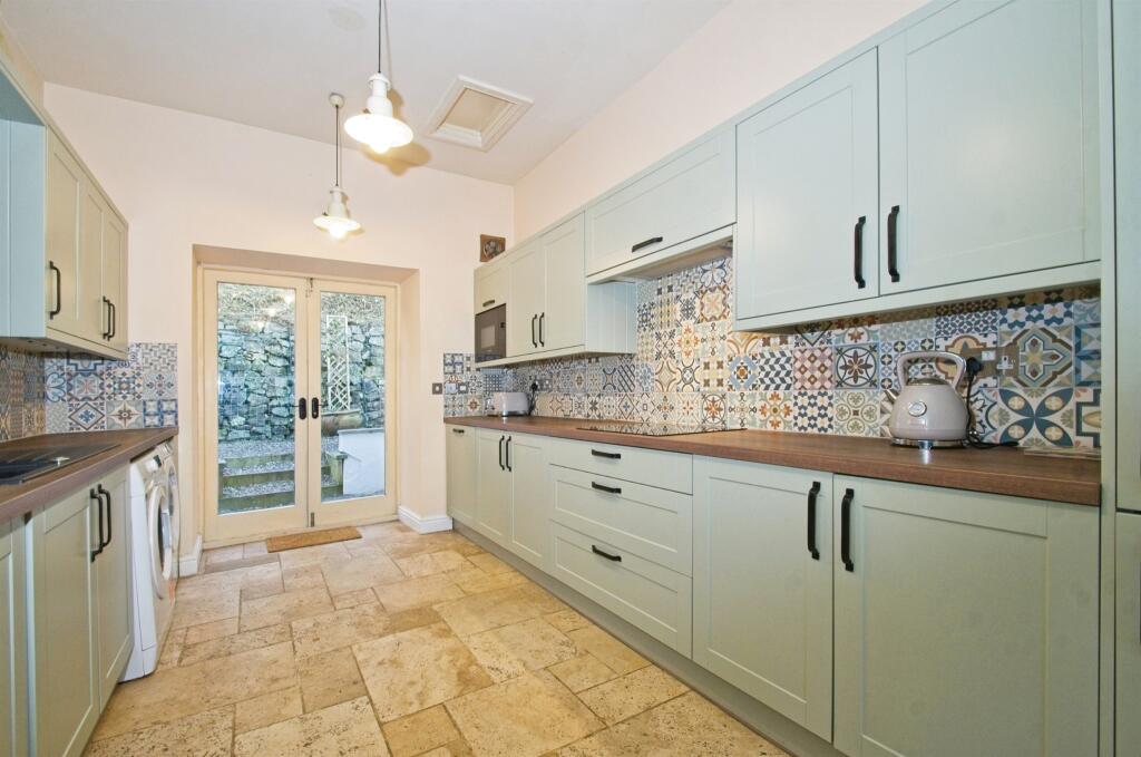 Main image of property: The Coach House