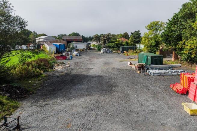 THE SITE AS IT STANDS
