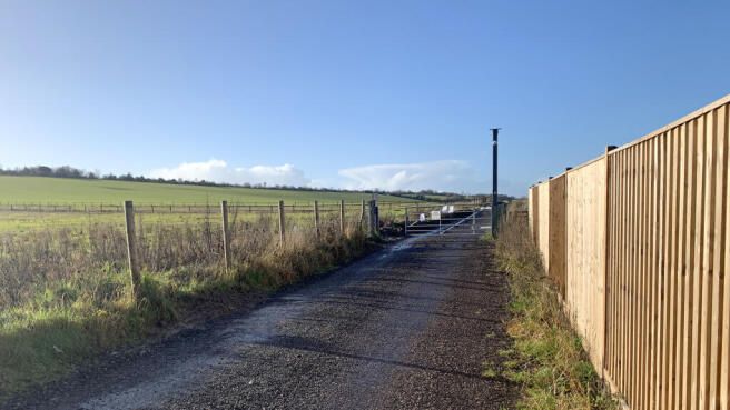 Access is via a private, gated track.
