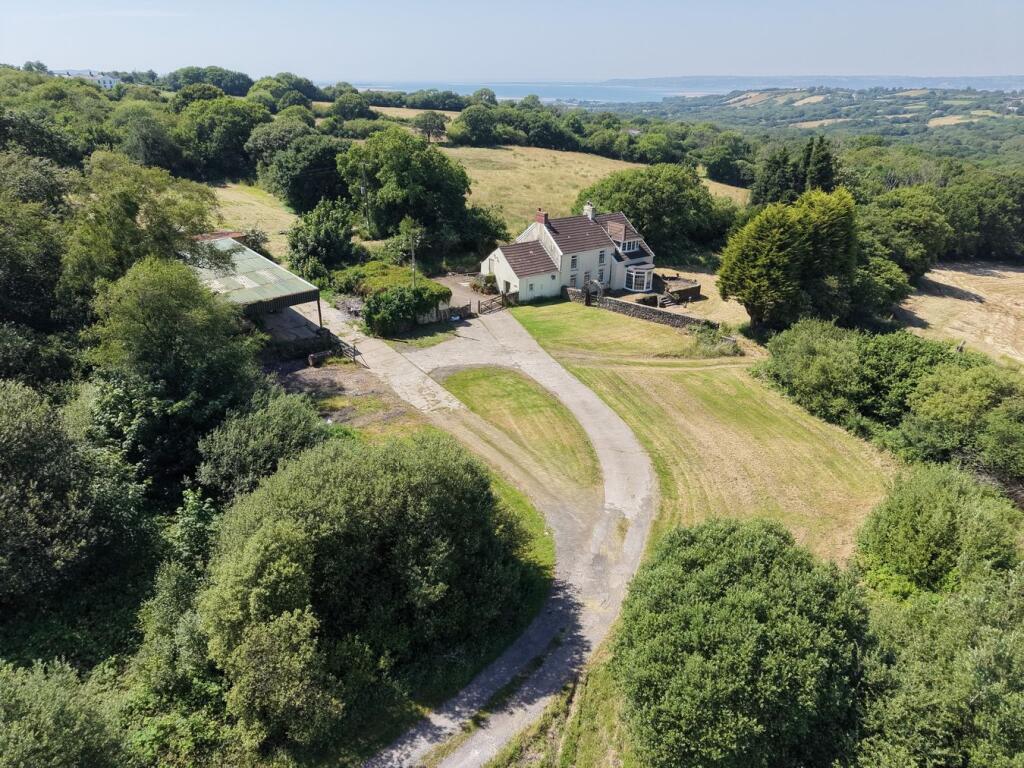 Main image of property: Three Crosses, Swansea, SA4