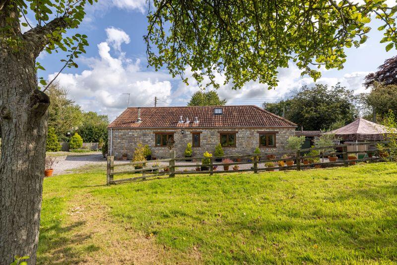 Main image of property: Delightful barn conversion with paddock and parking