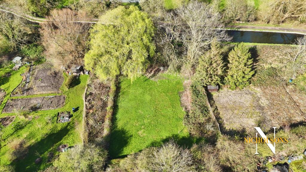 A 1/4 acre of allotment land off Albert Road