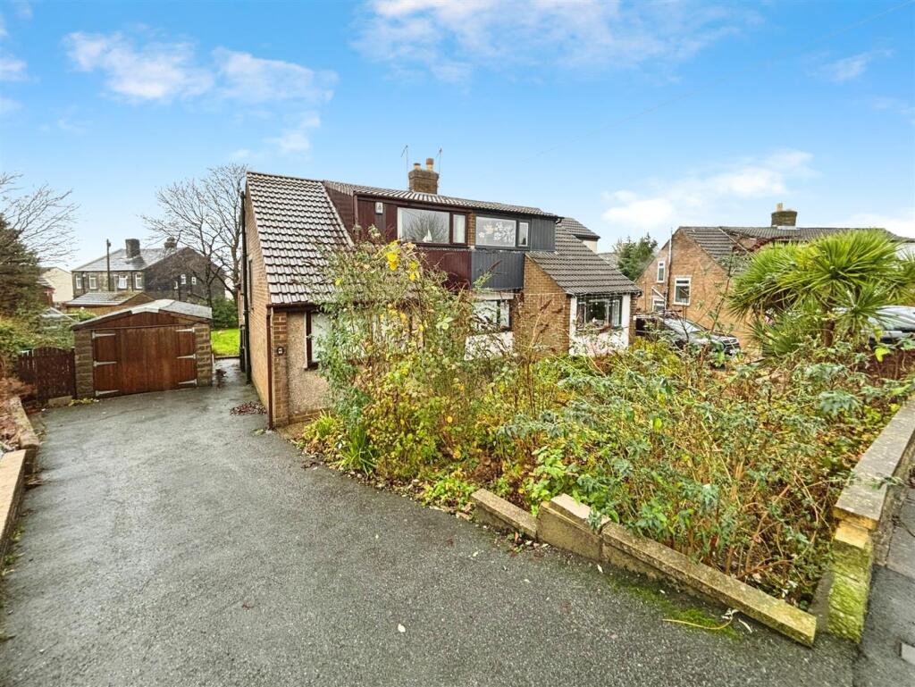 Main image of property: Raeburn Drive, Bradford, BD6 2LN