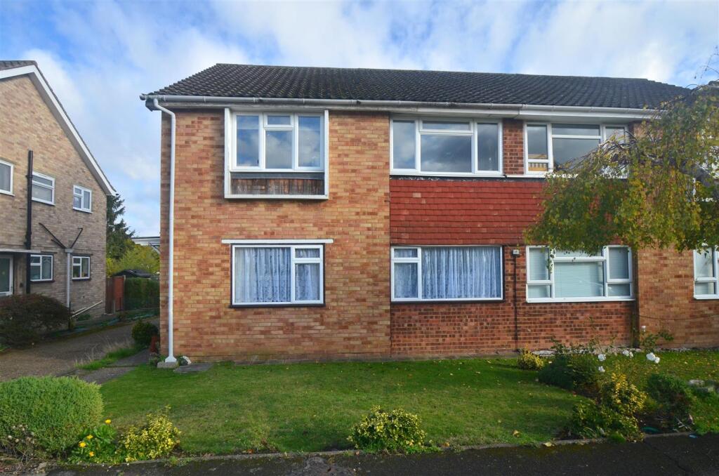 Main image of property: Wimborne Close, Epsom, KT17 4DP
