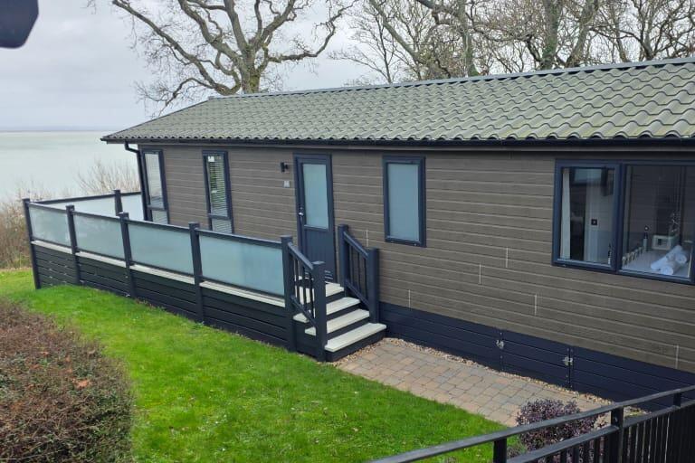 Main image of property: Cambrian Sandalwood (2014), Woodside Coastal Retreat, Lower Woodside Rd, Wootton, Isle of Wight, PO33 4JT