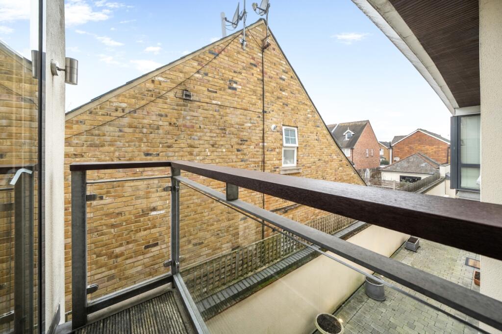 Main image of property: Elmgrove Mews Weybridge KT13