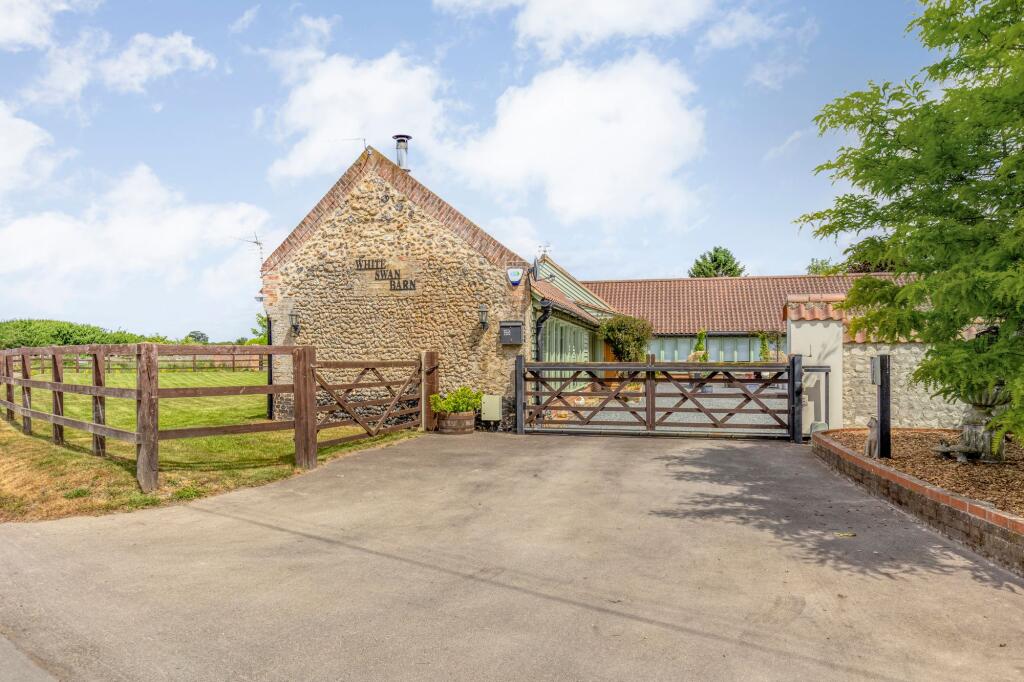 Main image of property: Impressive Brick and Flint Barn Conversion in Hockwold