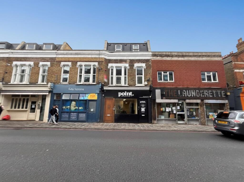 Main image of property: 22 Trinity Road, London, SW17 7RE