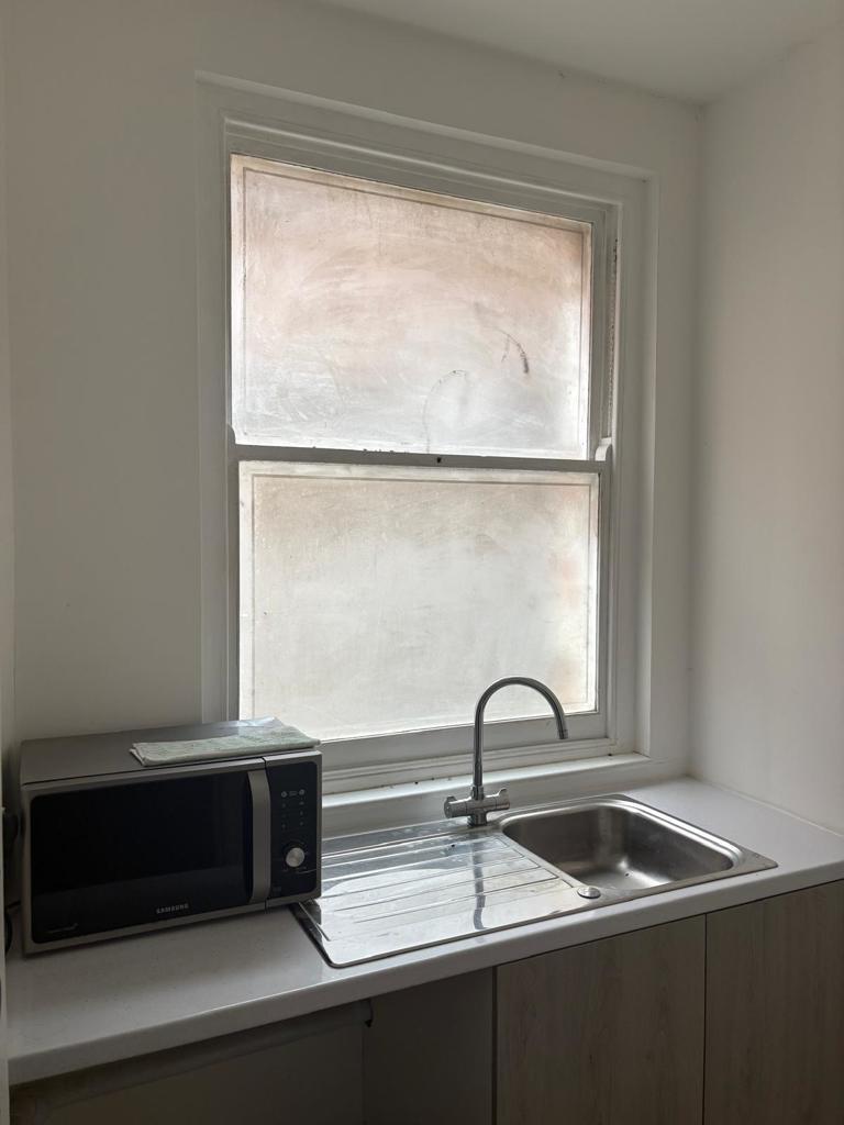 Photo 33. Kitchenette to retail unit .