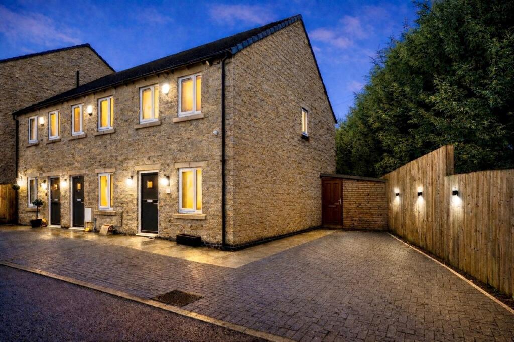 Main image of property: John Walton Close, Glossop
