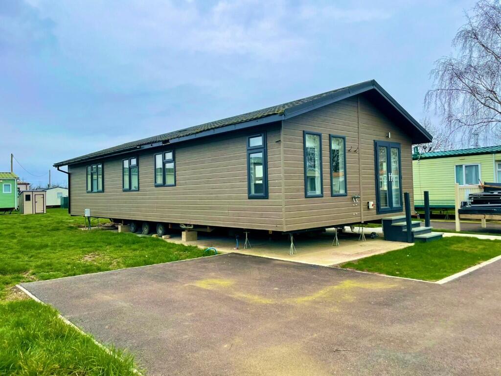 Main image of property: Honeysuckle Lodge, Manor House Holiday Park, Church Laneham, Nottinghamshire