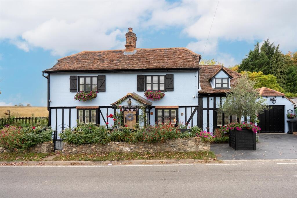 Main image of property: Hobbs Cross, Matching