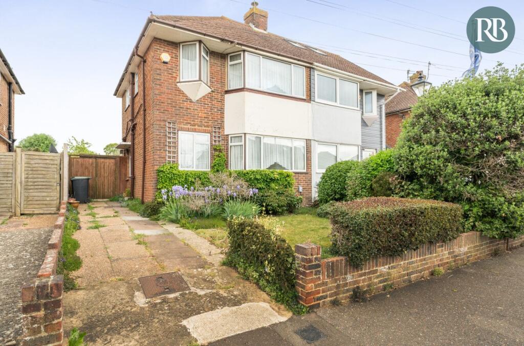 Main image of property: Downland Avenue, Southwick, BN42 4RF
