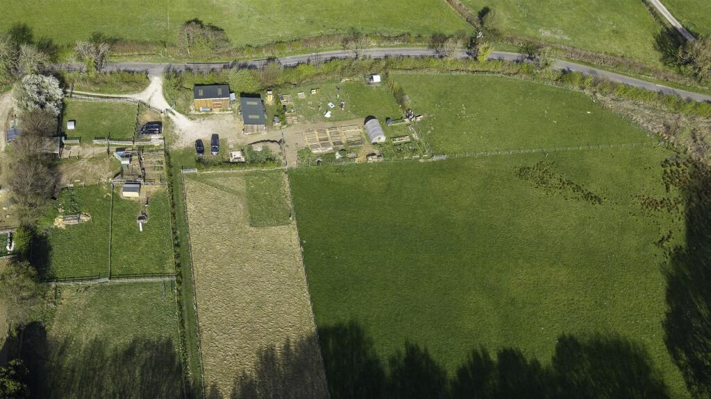 Main image of property: Land and Stables off Ashover Road, S42 6AQ