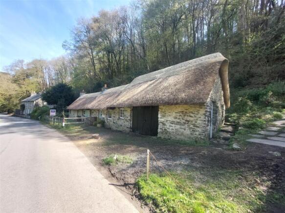 thatched workshops and detached house