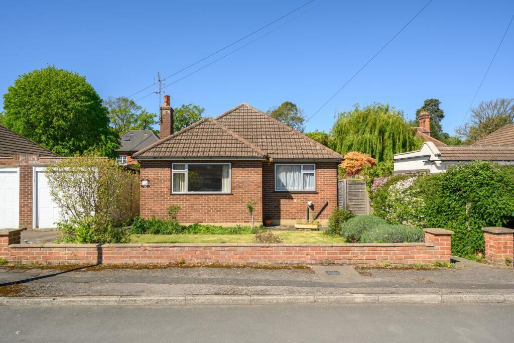 Main image of property: Burlea Close, Hersham Village, KT12
