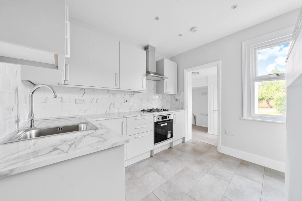 Main image of property: Ember Lane, Esher, KT10