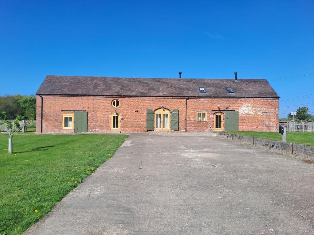Main image of property: Threshing Barn
