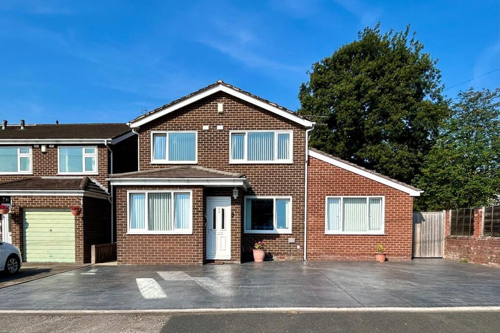 Main image of property: Roseacre Drive, Heald Green, SK8