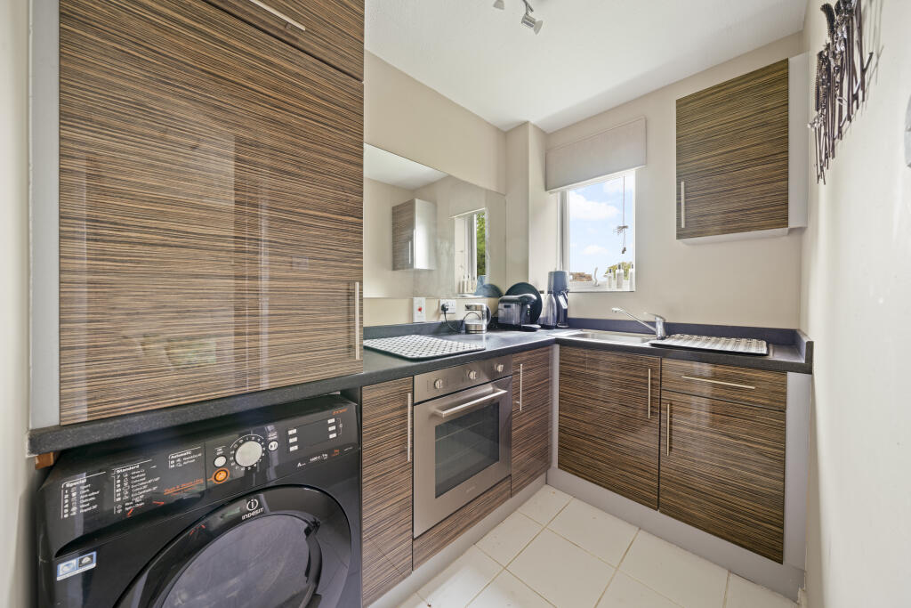 Main image of property: The Newlands, Weston Green Road, Thames Ditton, Surrey, KT7