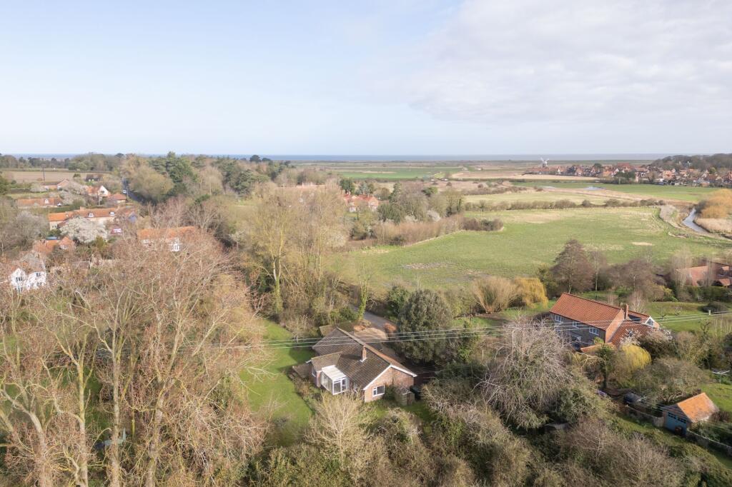 Main image of property: Single Story Modern Living in Wiveton