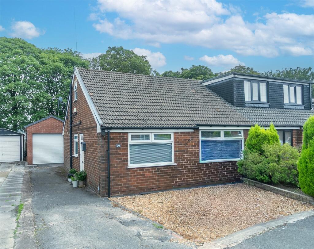 Main image of property: Woodlands Road, Milnrow, Rochdale, Greater Manchester, OL16
