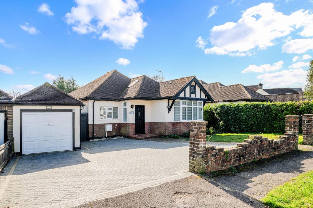 Main image of property: Oakleigh, 9 Woodlands Drive, RH9