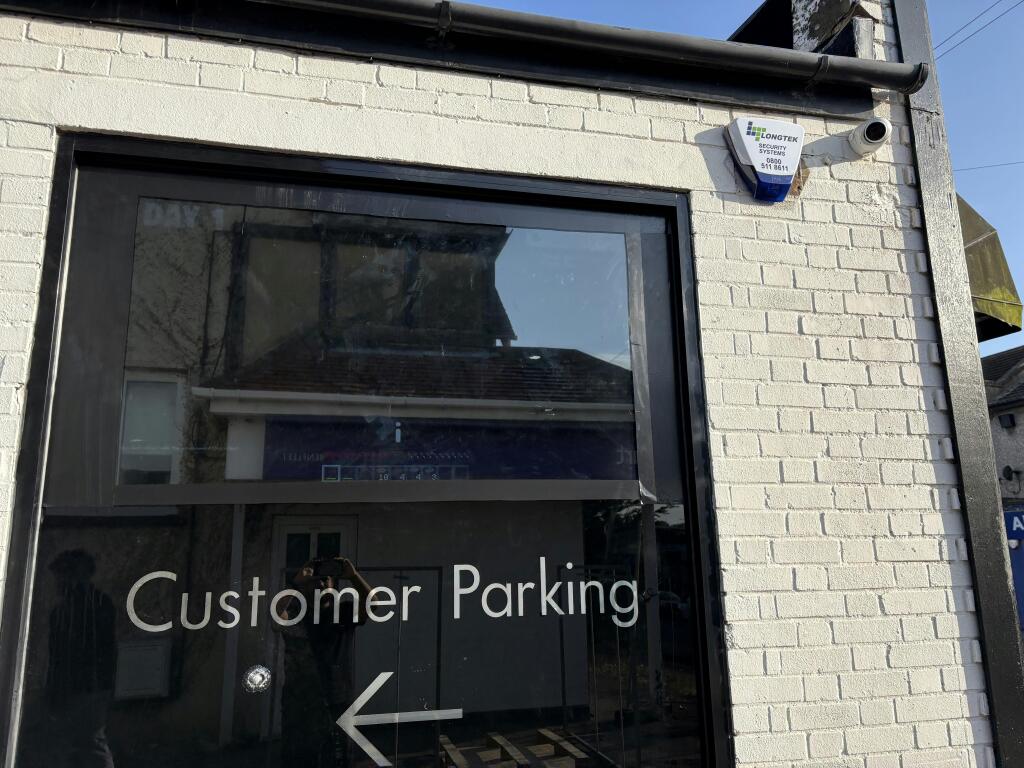 P02 - Customer parking sign.jpg