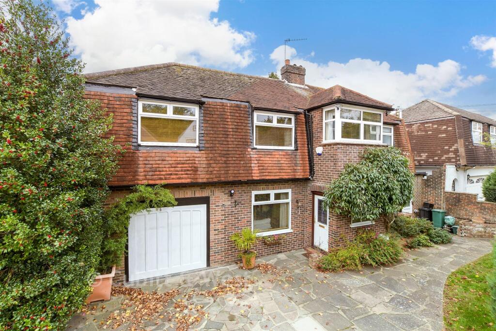Main image of property: Green Curve, Banstead, Surrey